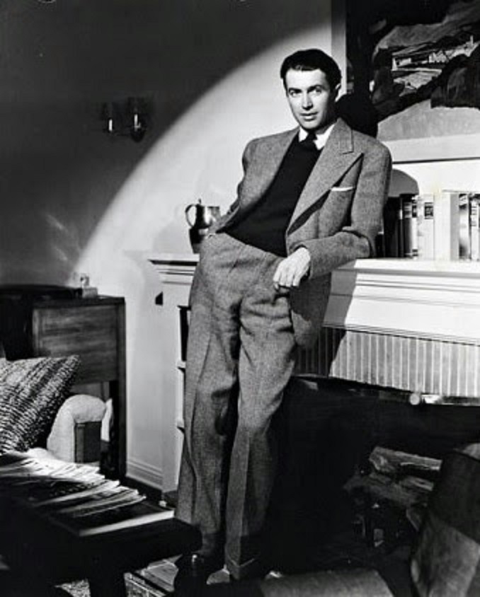 Jimmy Stewart at his fireplace.