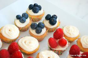 4th of july cupcakes topped with fruit to create an american flag