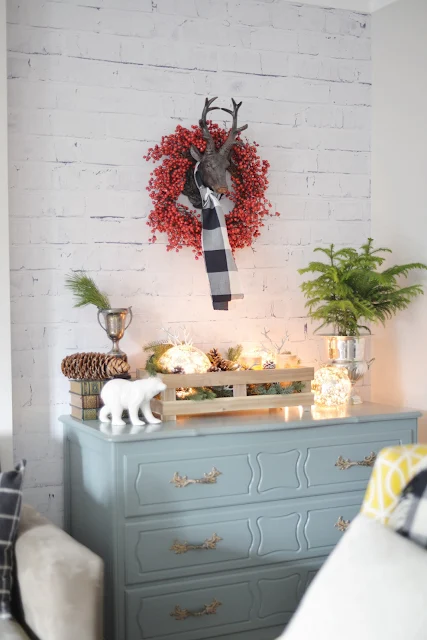 whitewashed brick wallpaper | rustic decorations | reindeer head plaid scarf | Ramblingrenovators.ca