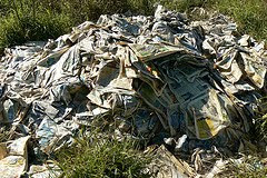 pile of decomposing newspapers