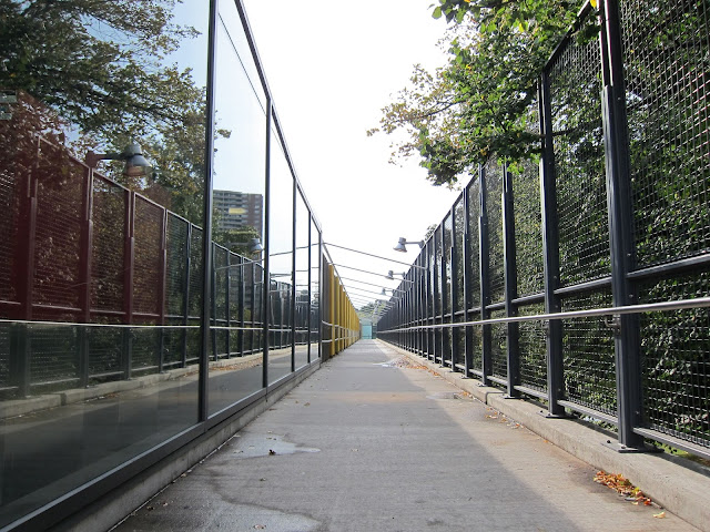 Pedestrian walkway along the north side of Victoria Park station