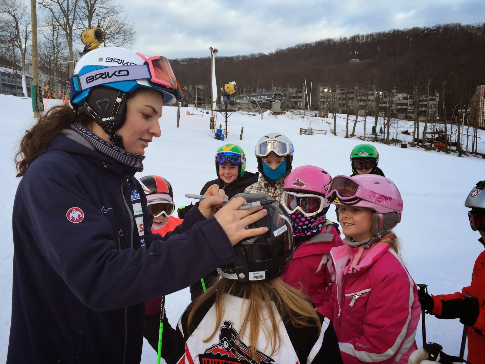 Megan McJames signing helmets at Wintergreen Resort olympian, world cup skier, signature, helmets, Wintergreen Resort, McJames