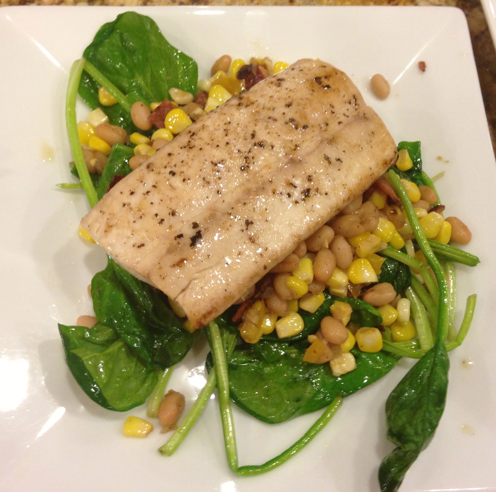 TASTE OF HAWAII MAHI MAHI WITH SPINACH, WHITE BEANS, CORN AND BACON
