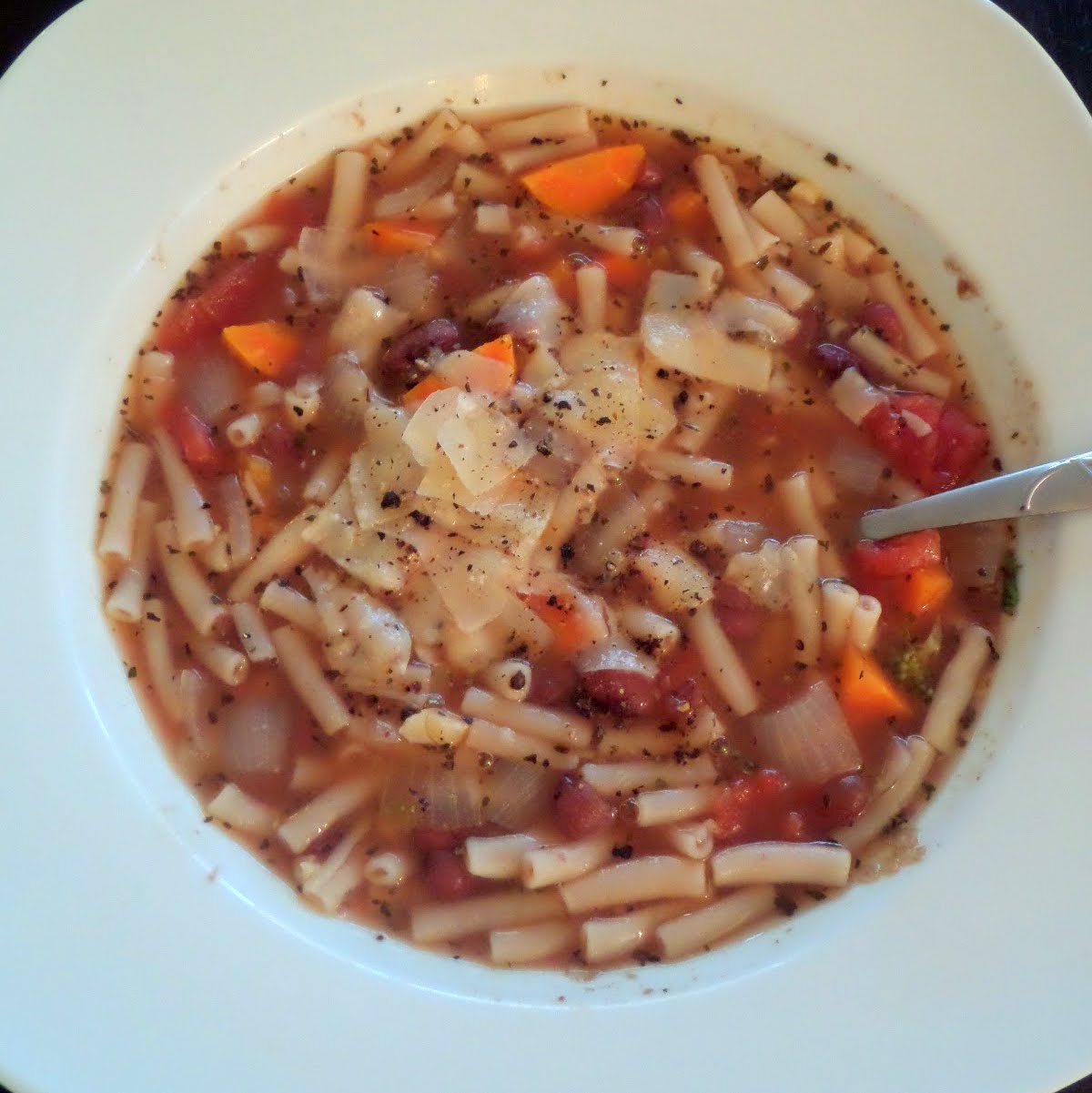 Minestrone Soup:  A simple, vegetarian, Italian style soup made with vegetables, beans, pasta, tomatoes and spices.