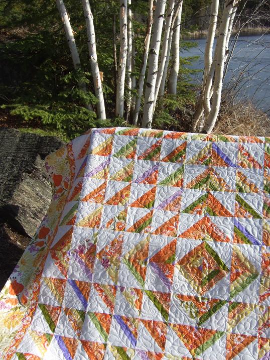 Tamarack Shack Orange HST Strip Quilt