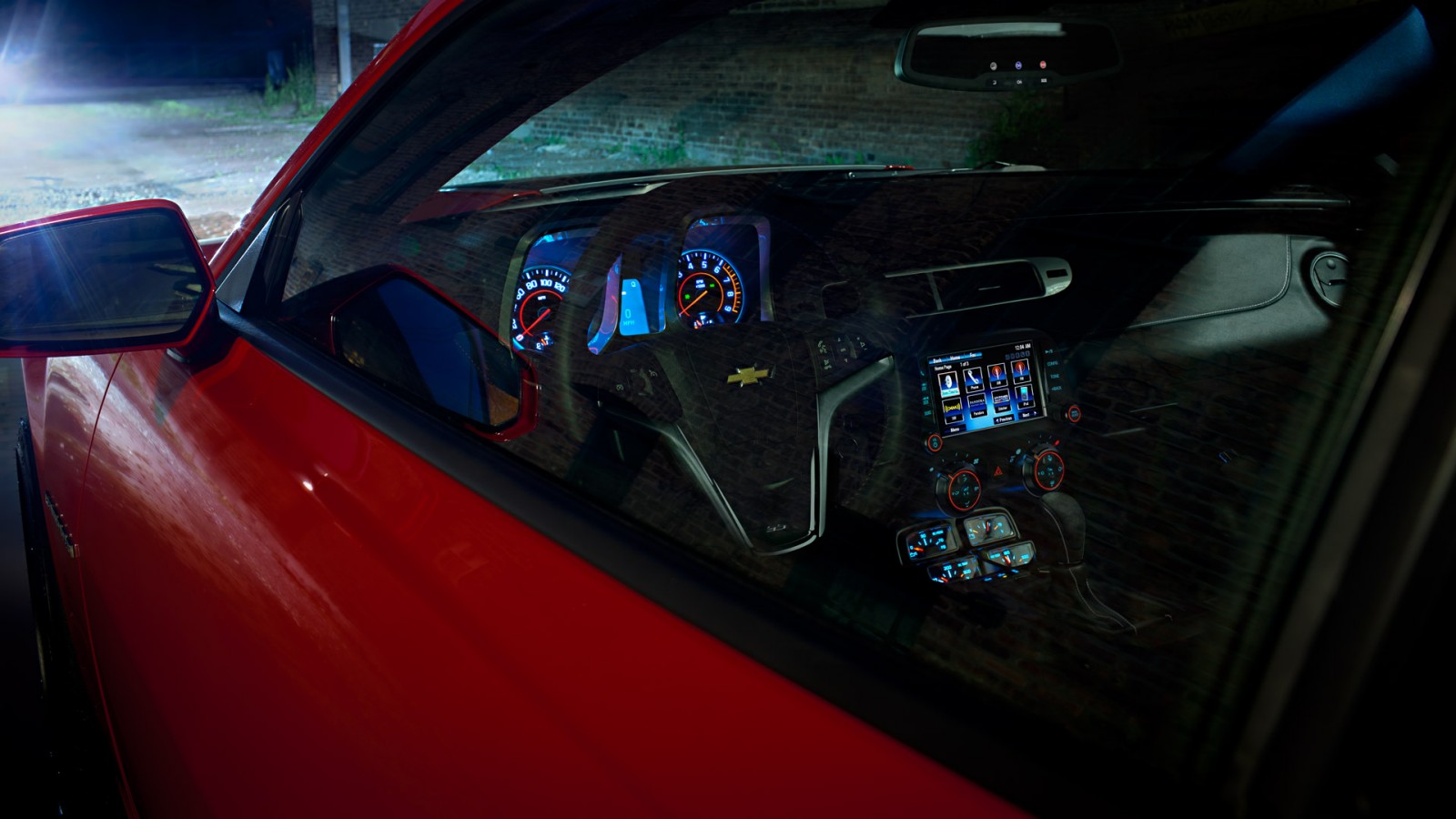 Camaro-2013-chevrolet-interior-cockpit-steering-dashboard-night-view.jpg
