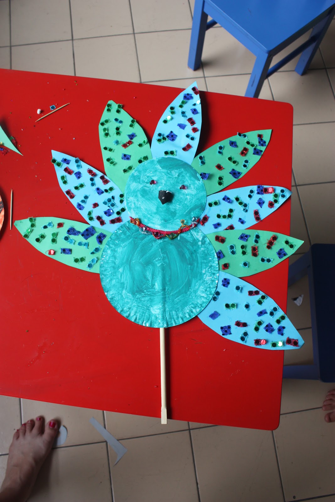 whirls and twirls around the world India crafts Paper plate peacock