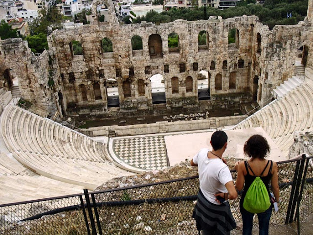 tourists at the ancient amphitheater in Athens