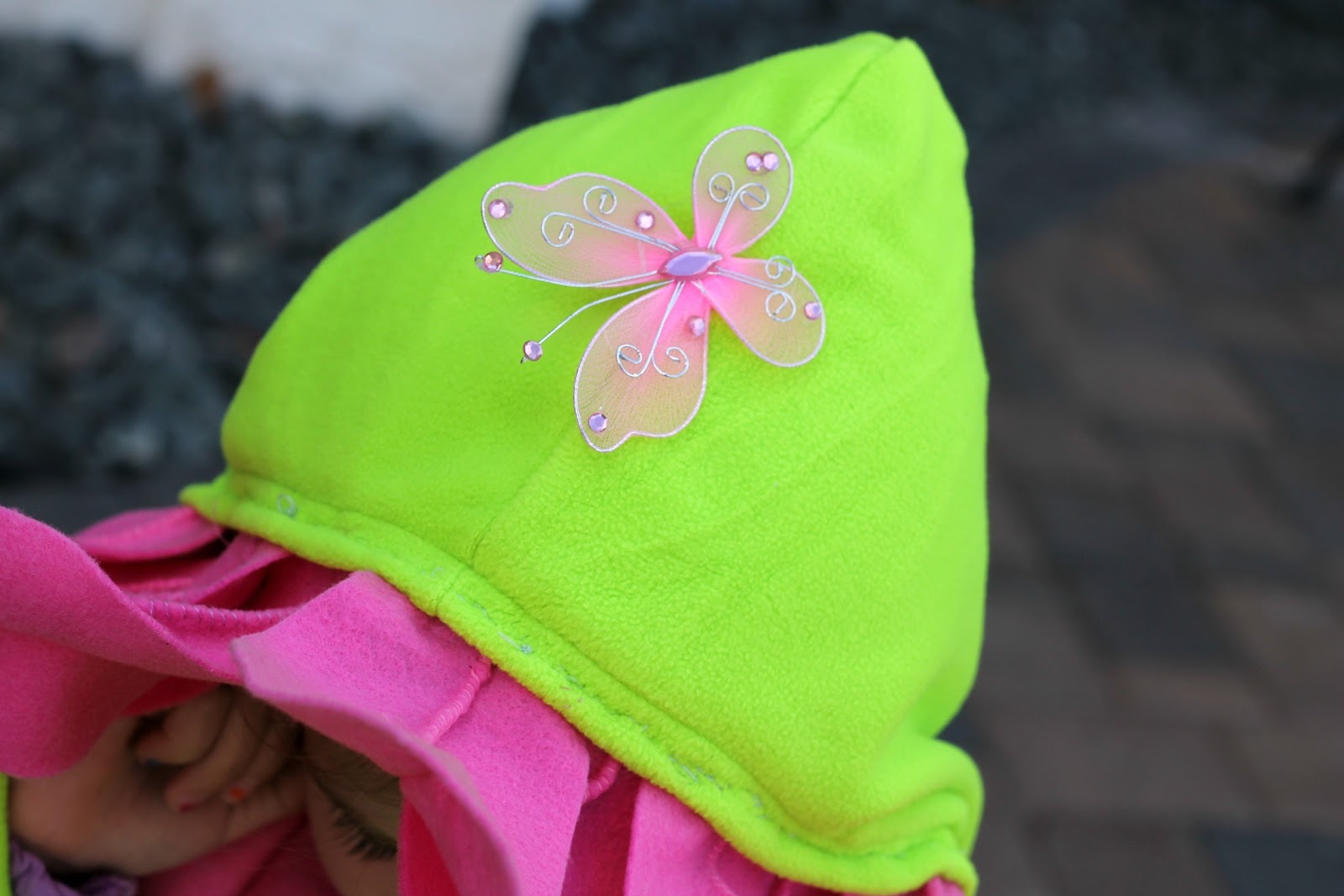 Make an easy (and warm!) flower costume for Halloween from a sweatshirt and felt.