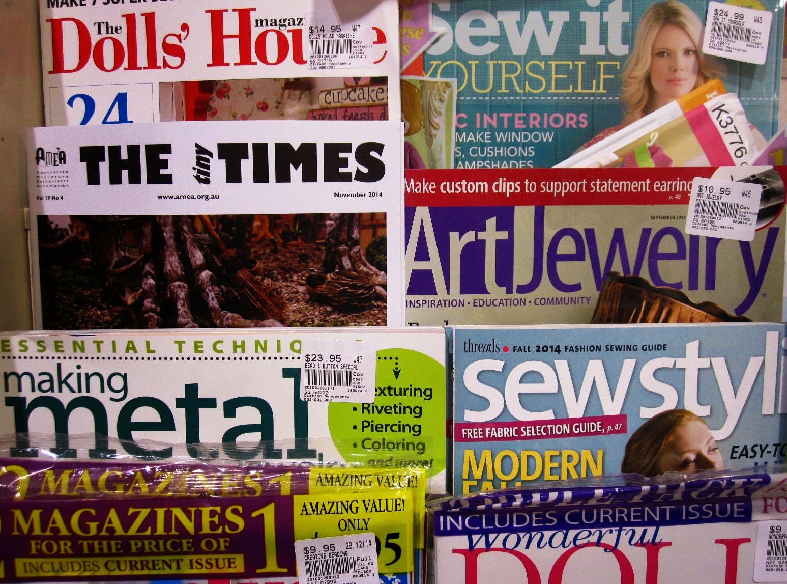 November issue of The tiny Times, displayed amongst the magazines at a newsagents.