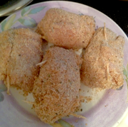 Chicken breasts rolled and ready to fry.