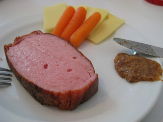 Eating Leberkäse with sweet mustard (süßer Senf)