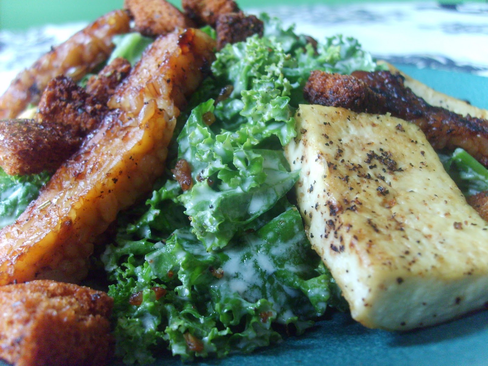 Basil Bakery Kale Caesar Salad with Tempeh Bacon and Tofu