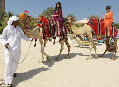 OMG..How did Kim Kardashian mount a Camel With 8 Inches Louboutins 4