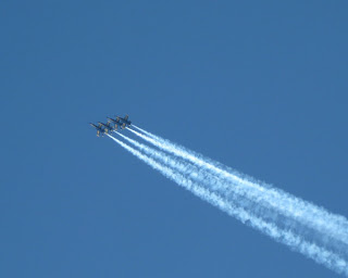 Four Blue Angels streak across the sky, San Francisco, California