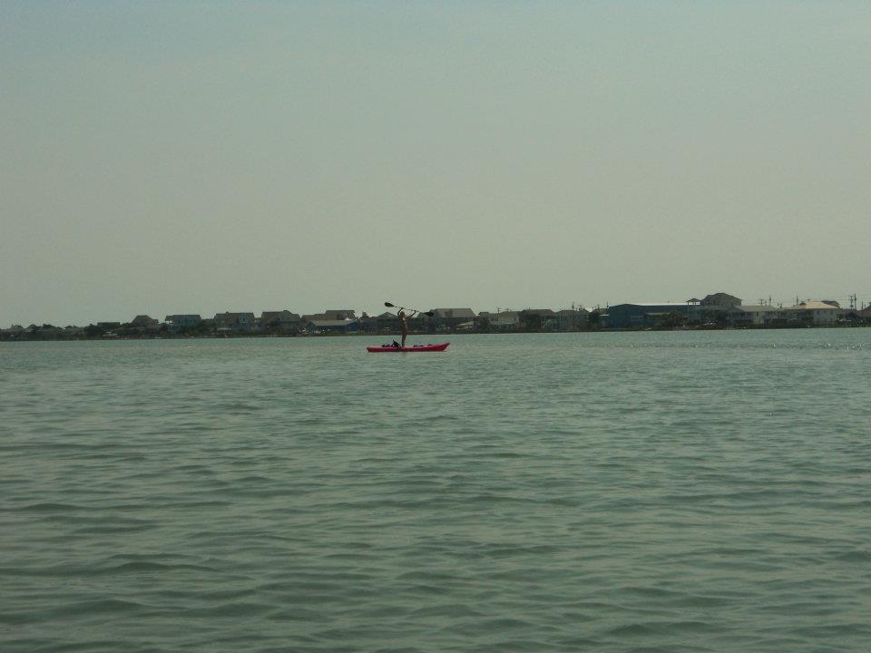 Go Outside Girl Kayaking the coast Topsail Island, NC