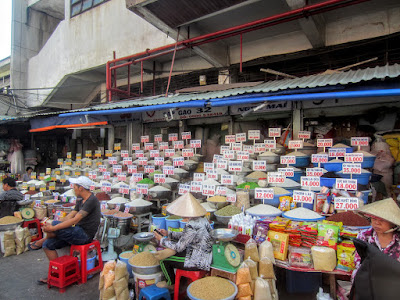 Various spices and goods on display in a market in Hanoi