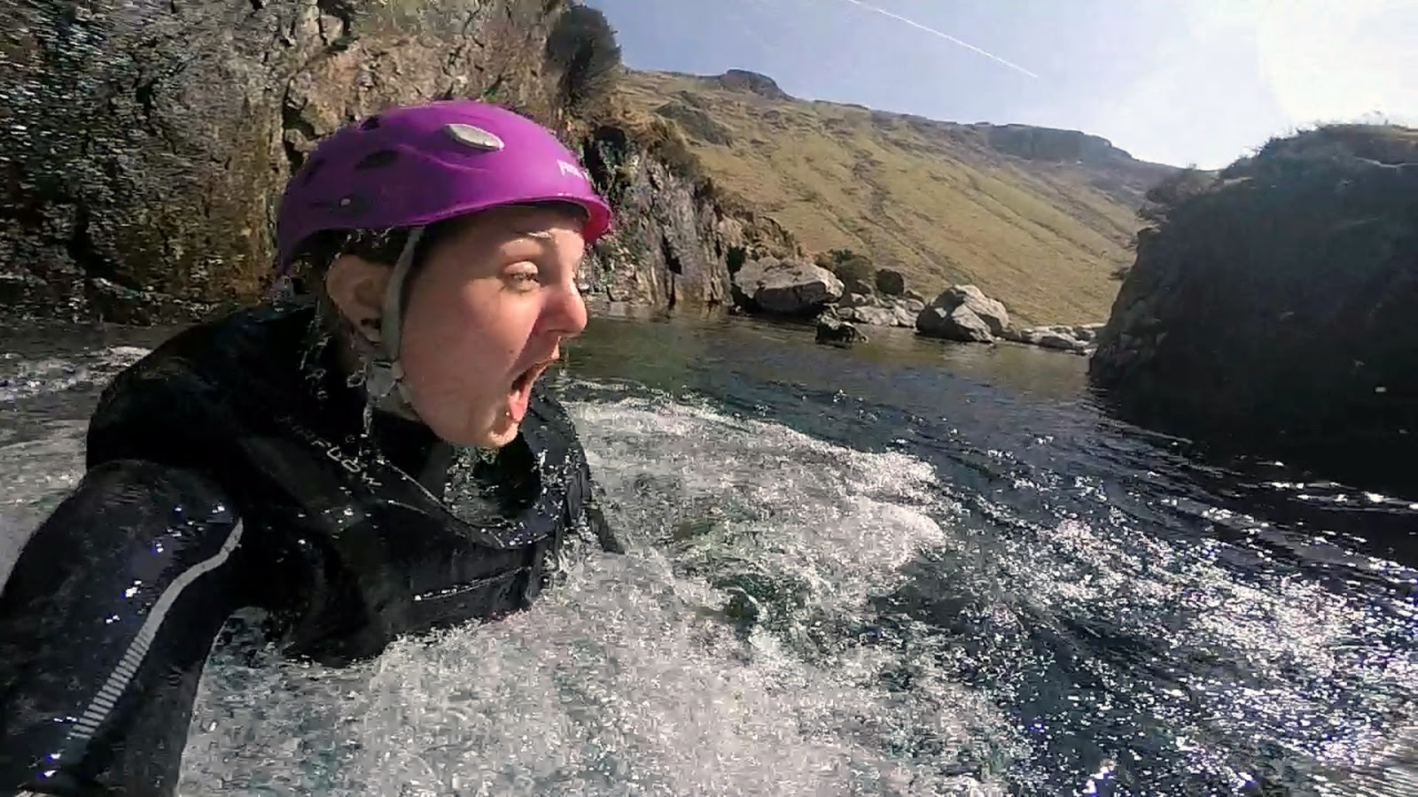CANYONING in the crystal clear waters of the Esk in the LAKE DISTRICT