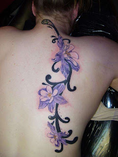 lily flower tattoos on back women