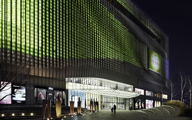 Entrance into the galleria at night with facade lighten up