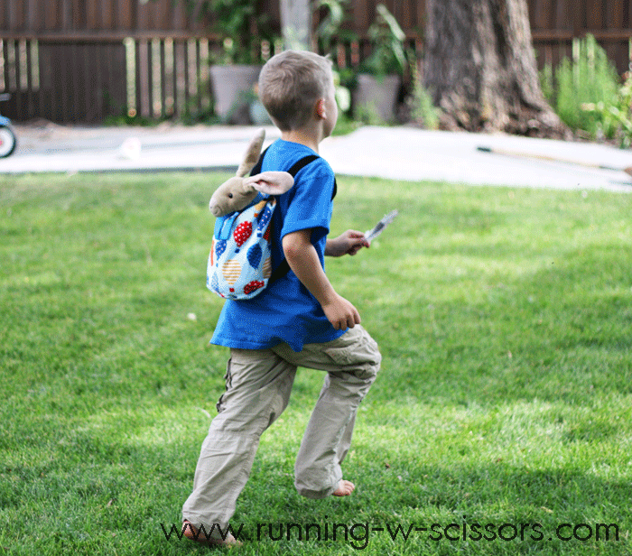 kid running with backpack