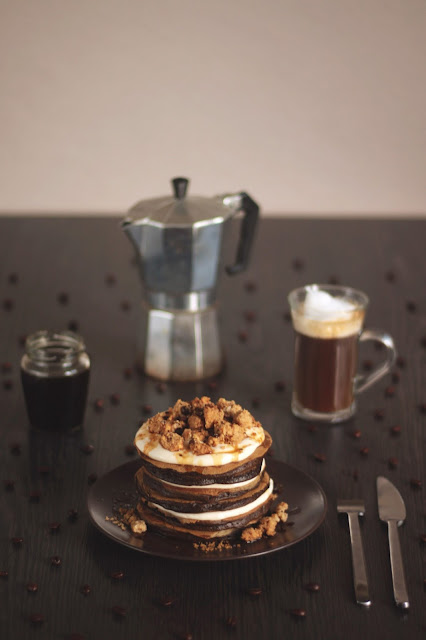 A sweet coffee pancake stack to start your morning - topped with classic cheesecake frosting, coffee crumbles and espresso syrup. Even if you don't like coffee, you'll like this recipe! Created by the German food blog Pancake Stories.