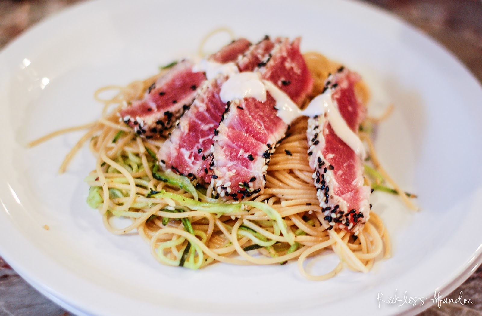 Reckless Abandon Seared Ahi Tuna on a Bed of Zucchini Ribbons and
