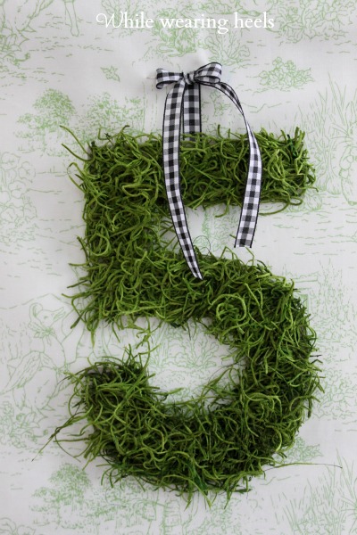 while wearing heels moss number and letter garland moss letter