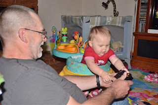 Alice shows pop pop how to play