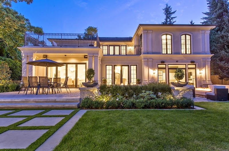 This Elegant Custom French Inspired Residence is Situated on a Large