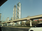 The Emirates Park Towers seen from a taxi. The Emirates Park Towers are some . (dsc )