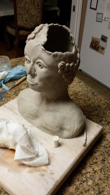 Ceramic pottery sculptural bust of negro woman, in progress.