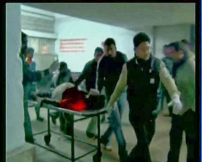 Blast injured being taken to the hospital