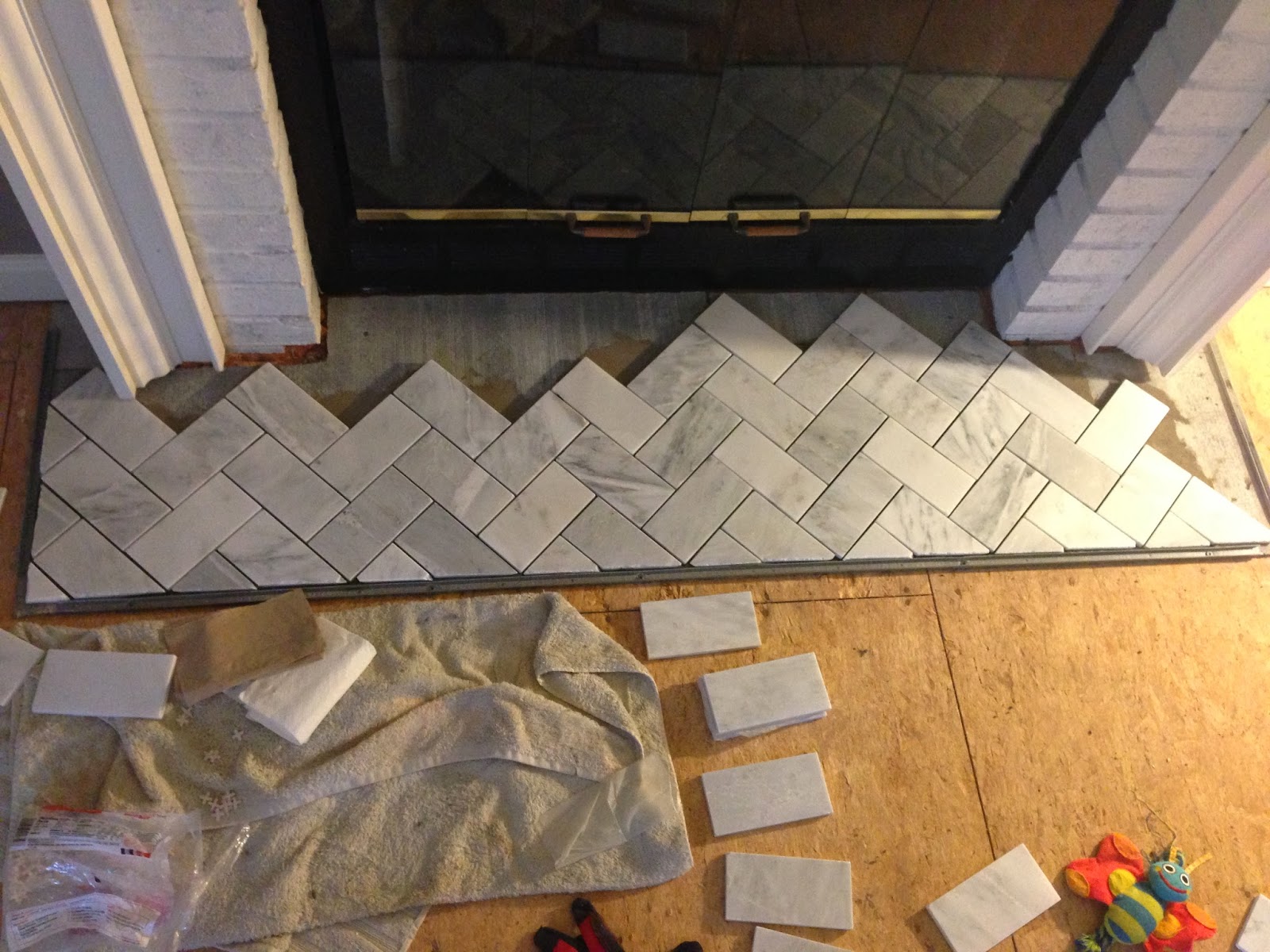 Chic meets Healthy FIREPLACE HEARTH PT. 1 HERRINGBONE MARBLE TILE HEARTH