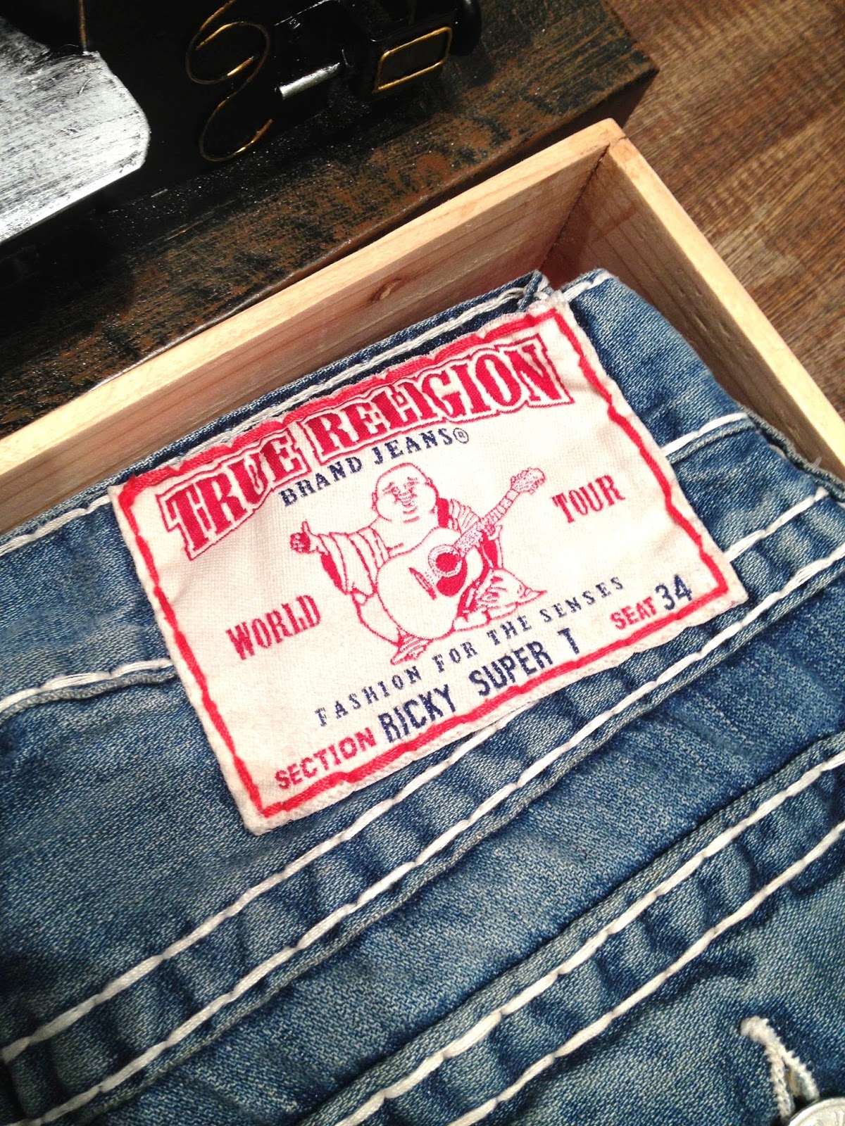 jeans with horseshoe logo