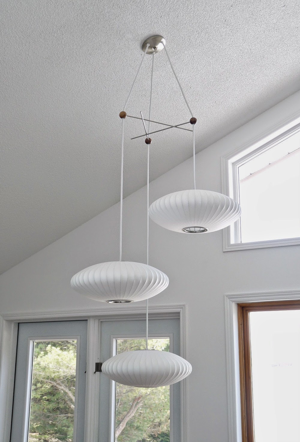 Three Saucers in the Dining Room Triple Bubble Light Fixture from