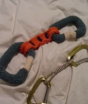 http://www.ravelry.com/patterns/library/rock-climbing-quickdraw-2-carabiner-types