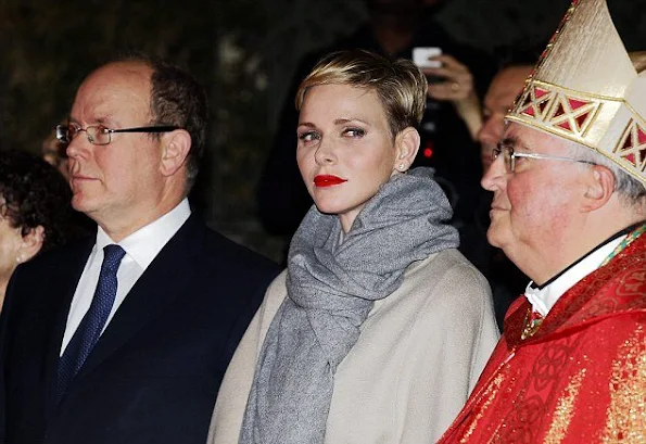 Princess Charlene of Monaco and Prince Albert II of Monaco attend the Sainte-Devote ceremony