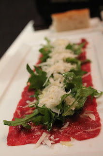 Beef Carpaccio with Rucola and ‘Vacche Rosse’ Parmigiano Cheese
