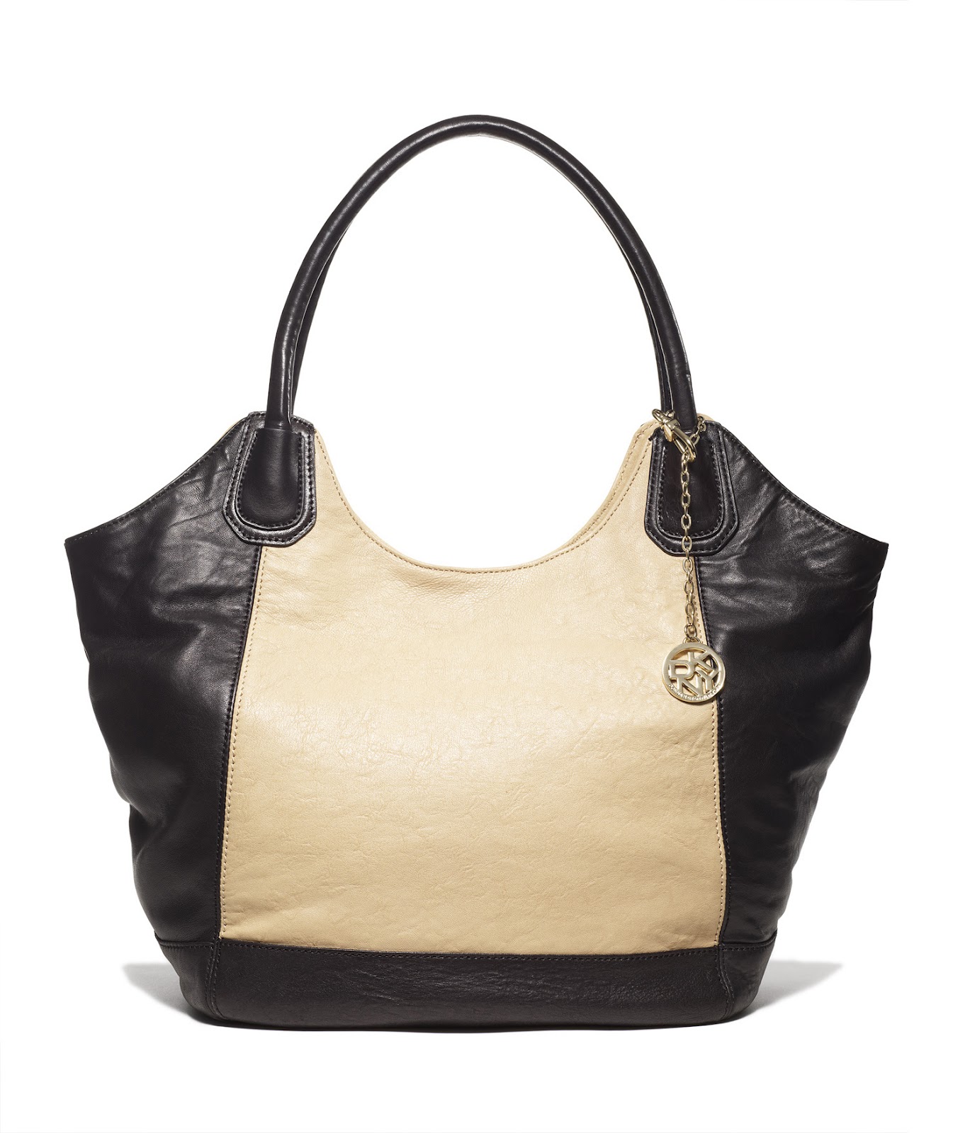 http://1.bp.blogspot.com/-TUTxkr-htlA/T2XrM6UaQCI/AAAAAAAAKqc/ysYvgnvSFNg/s1600/DKNY-Spring-2012-Bags-06.jpg