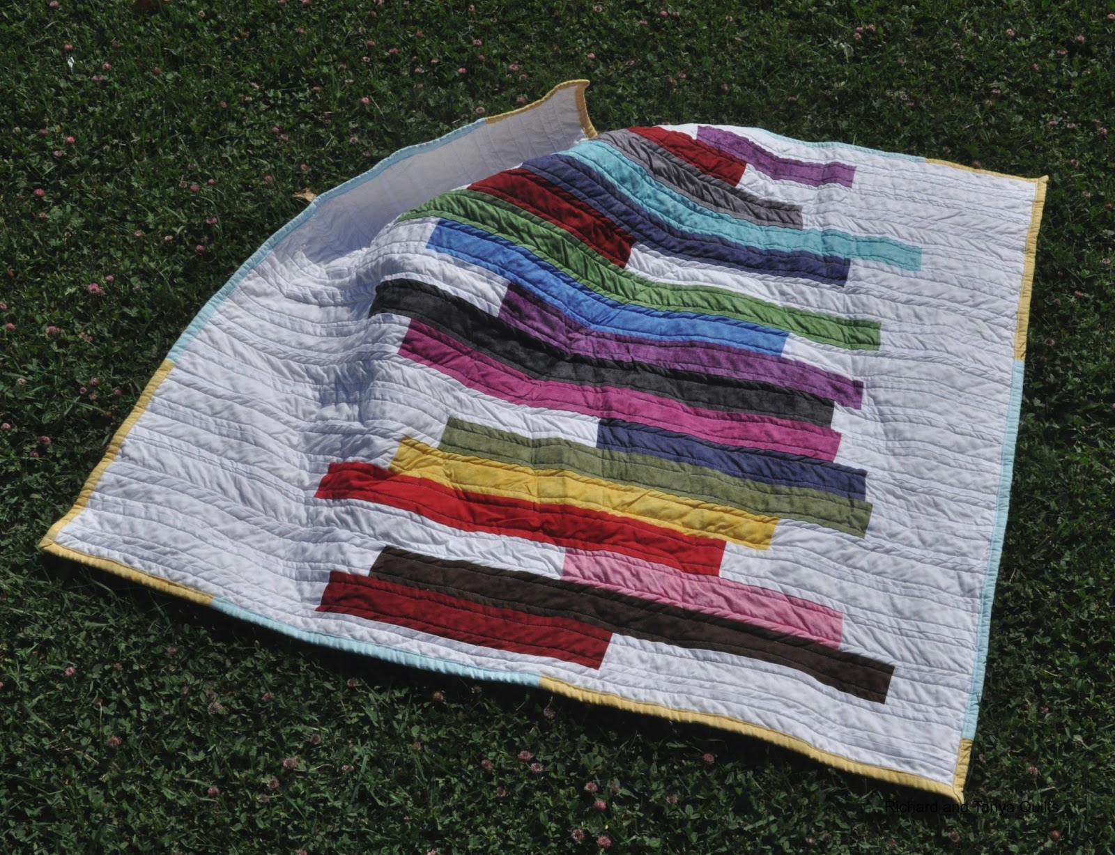 Richard and Tanya Quilts Modern Take on Jelly Roll Race