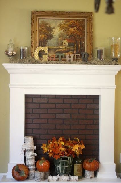 faux fireplace with faux brick with Fall mantel www.goldenboysandme.com