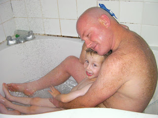 nude dad and son taking bath