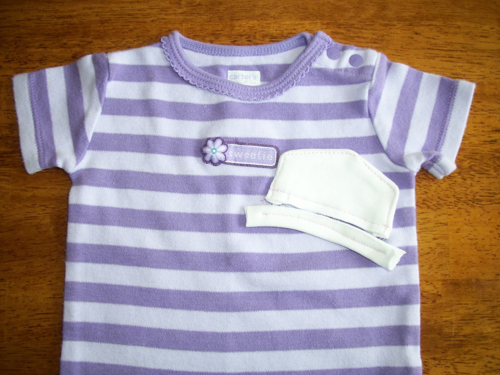 Up In Stitches Sewing Sewing welt pockets into onesies for babies with