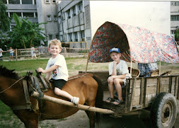 Our kids growing up in Romania!