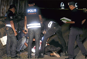 Pemandu teksi maut di kubur