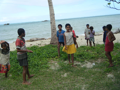 kids play on the beach