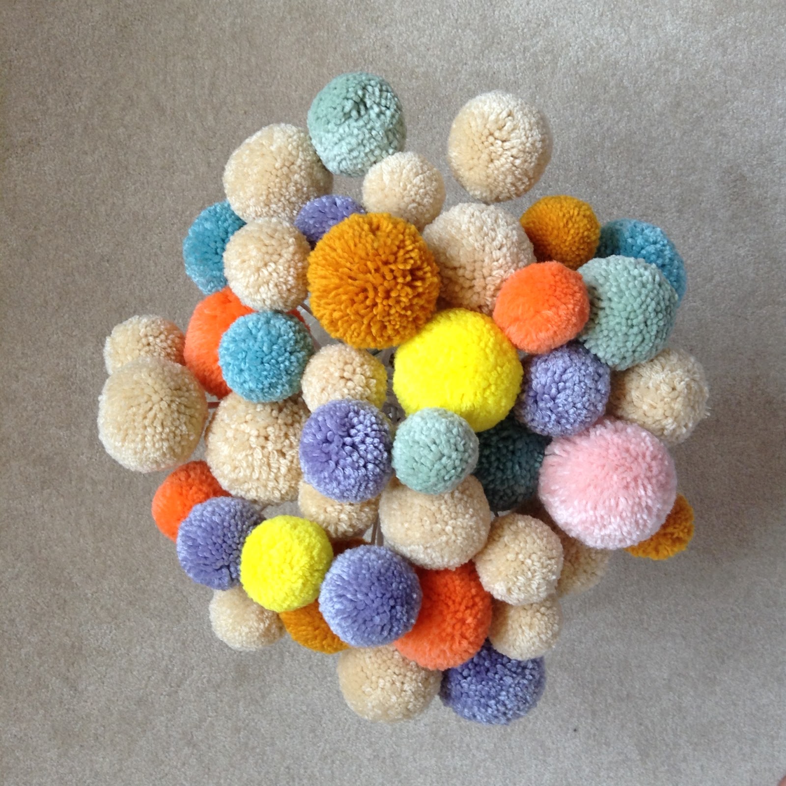 Oh the Cuteness! Shop Update Yarn Bombing Kits, handmade pom pom flowers, giant paper flower
