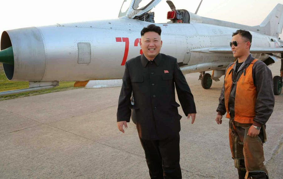 النشاطات العسكريه للزعيم الكوري الشمالي كيم جونغ اون .......متجدد  Kim+Jong-un+guiding+Air+Force+MiG-21+during+flight+training++1