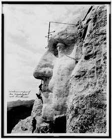 Workman on Mount Rushmore